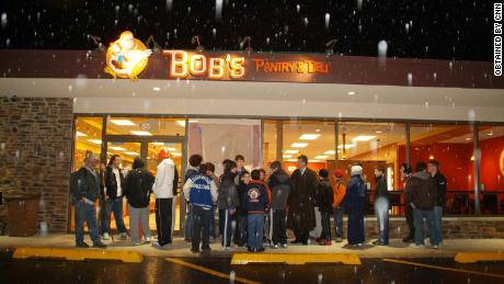 Loyal customers eagerly await the opening of Bob Crimo&#39;s deli in 2008.