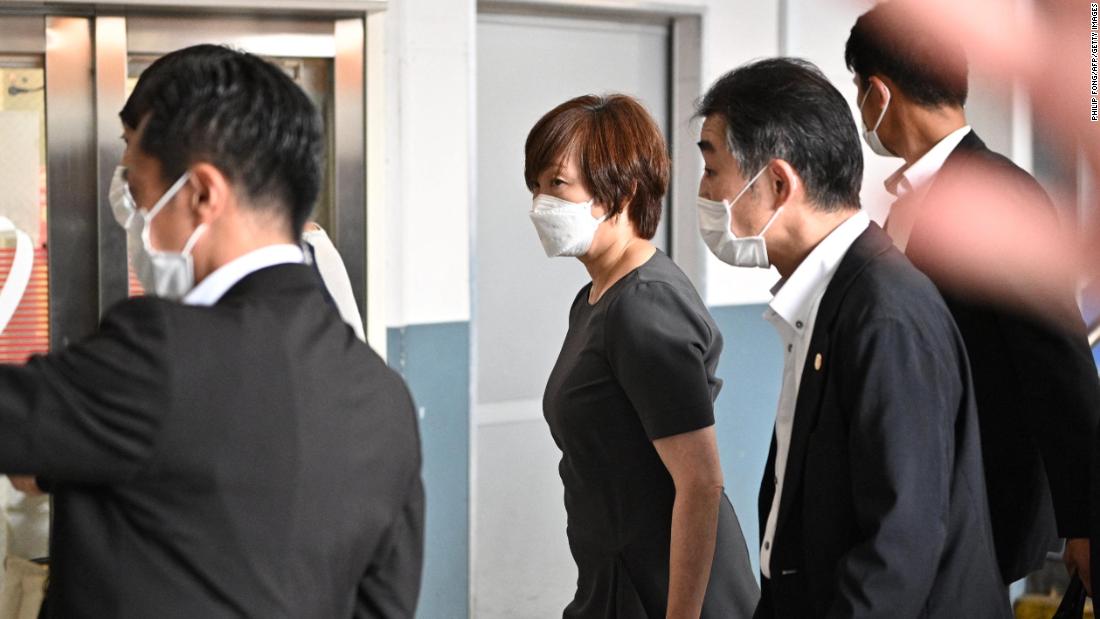 Abe&#39;s wife, Akie, arrives in Nara on Friday before heading to the hospital where her husband was transferred.