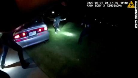 Jayland Walker exits his vehicle and runs before being shot to death by up to eight officers in Akron, Ohio, last month in a still image from police body camera video. 