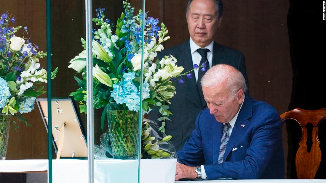 US President Joe Biden signs a condolence book at the Japanese ambassador&#39;s residence in Washington, DC, on July 8.