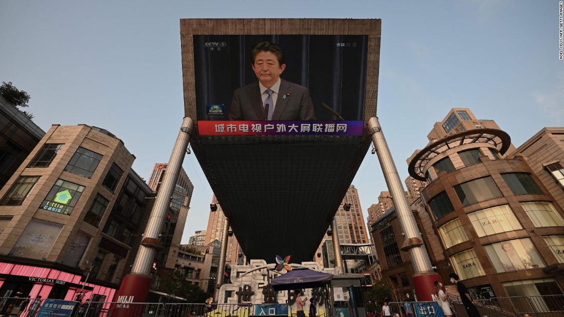 A large video screen in Beijing shows news of Abe&#39;s death.