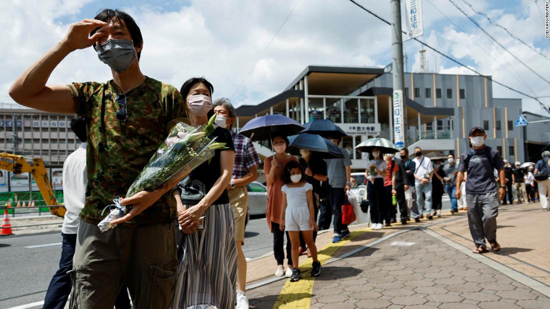 People line up to pay their respects in Nara.