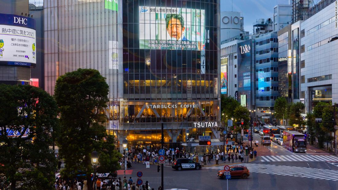 A screen at Tokyo&#39;s Shibuya Crossing shows news of Abe&#39;s death on Saturday.