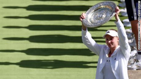 Elena Rybakina celebrates with the Venus Rosewater Dish trophy after winning the women&#39;s singles Wimbledon final.