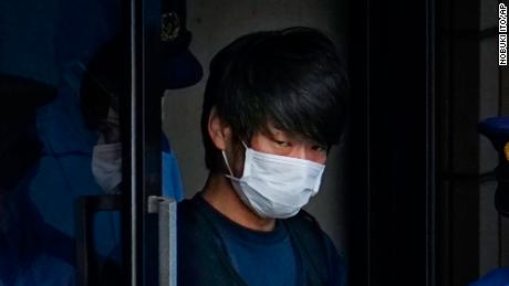 Shinzo Abe murder suspect Tetsuya Yamagami walks out of a police station in Nara on July 10.