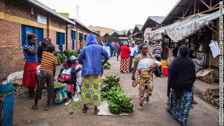 Daily life at a local market in Musanze, Rwanda. The town is known as a gateway to visit the country&#39;s mountain gorillas.  