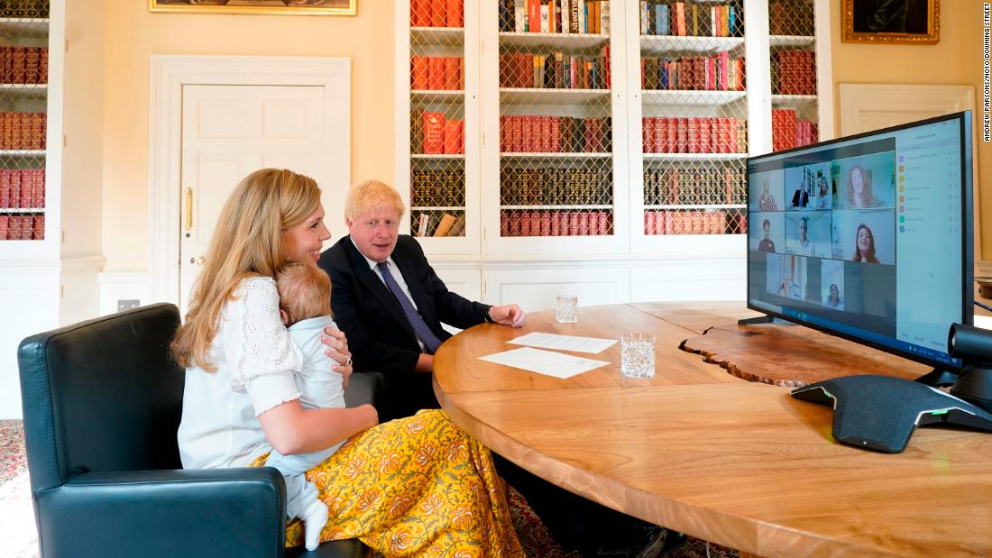 14/07/2020. London, United Kingdom. Boris Johnson and Carrie NHS Call.The Prime Minister Boris Johnson and his partner Carrie Symonds with their son Wilfred in the study of No10 Downing Street speaking via zoom to the midwifes that helped deliver their son at the UCLH. 