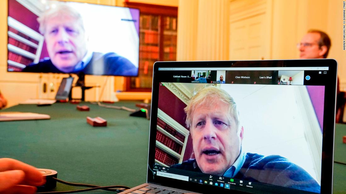 Johnson is seen via video conference as he attends a Covid-19 meeting remotely in March 2020.