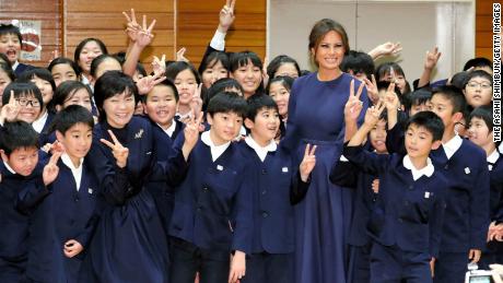 Akie Abe and Melania Trump meet school children during a visit to Kyobashi Tsukiji Elementary School in Tokyo on November 6, 2017.