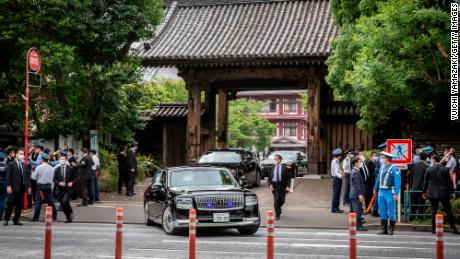 A car carrying Japanese Prime Minister Fumio Kishida leaves Jojoji Temple after the funeral of former Prime Minister Shinzo Abe on July 12.