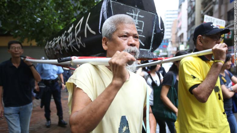 Hong Kong court jails veteran activist for plan to protest Beijing Olympics