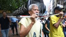 Hong Kong court imprisons veteran activist over Beijing Olympics protest plan