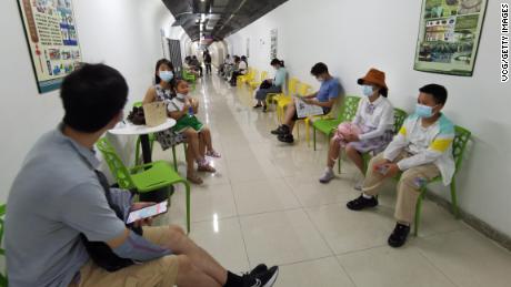 People escape the heat by heading to an air raid shelter in Nanjing, China, on July 10.
