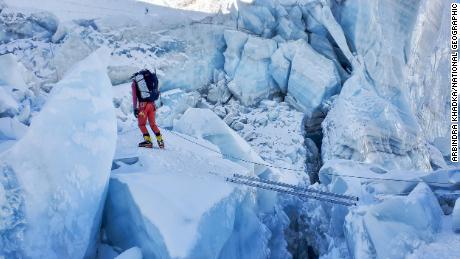 One of Perry&#39;s team members navigating the Khumbu Icefall. 