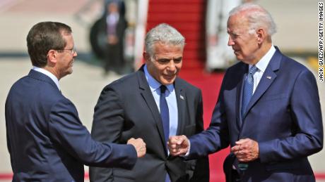 Fist bumps instead of handshakes: Biden tries to 