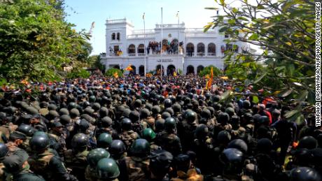 Sri Lankan protesters occupy the prime minister's office in Colombo on July 13.