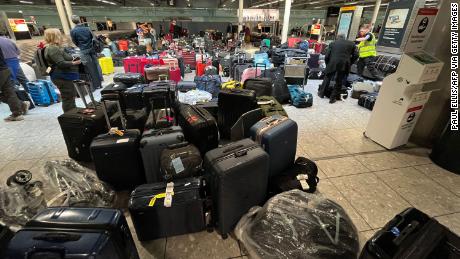 Suitcases are seen uncollected at Heathrow&#39;s Terminal Three bagage reclaim on July 8. Delta recently flew a flight from London with no passengers and 1,000 bags to try to solve the backlog of lost luggage affecting its customers.