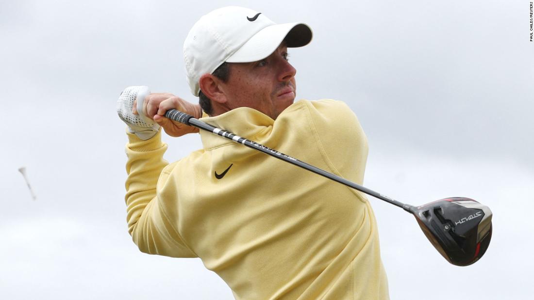 McIlroy hits ancient stone — and breaks PGA Tour employee’s hand — in eventful first Open round – CNN