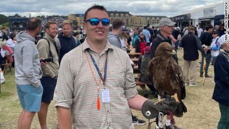Fearnley the red eagle with guide John of Elite Falconry, a company hired by R&A to keep troublesome seagulls off the Old Course at the 150th Open Championship.