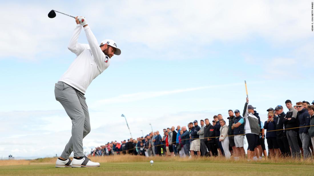Young roars into lead on Open Championship debut as Woods struggles