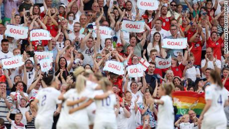 The crowd celebrates England's goal against Norway.