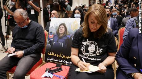 An image of slain Palestinian-American journalist Shireen Abu Akleh is placed on a chair at a news conference by Palestinian President Mahmoud Abbas and US President Joe Biden in Bethlehem, in the West Bank, on July 15, 2022. 