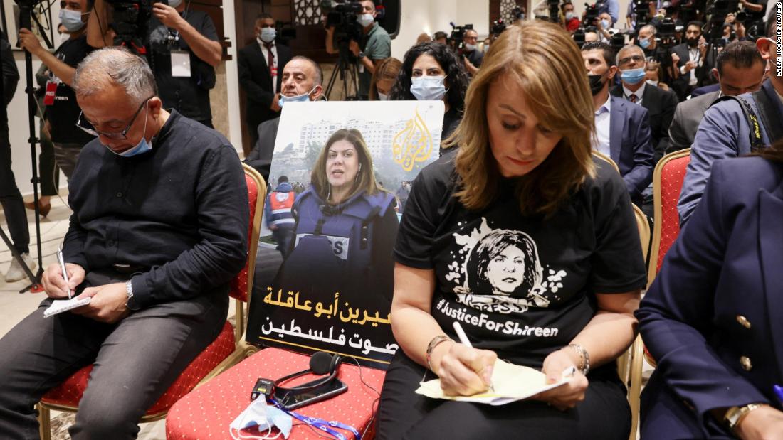 An image of Palestinian-American journalist Shireen Abu Akleh, who was fatally shot while covering an Israeli military operation in the West Bank, is seen on a chair at a news conference with Biden and Abbas. Biden said her death was &quot;an enormous loss to the essential work of sharing with the world the story of the Palestinian people.&quot;