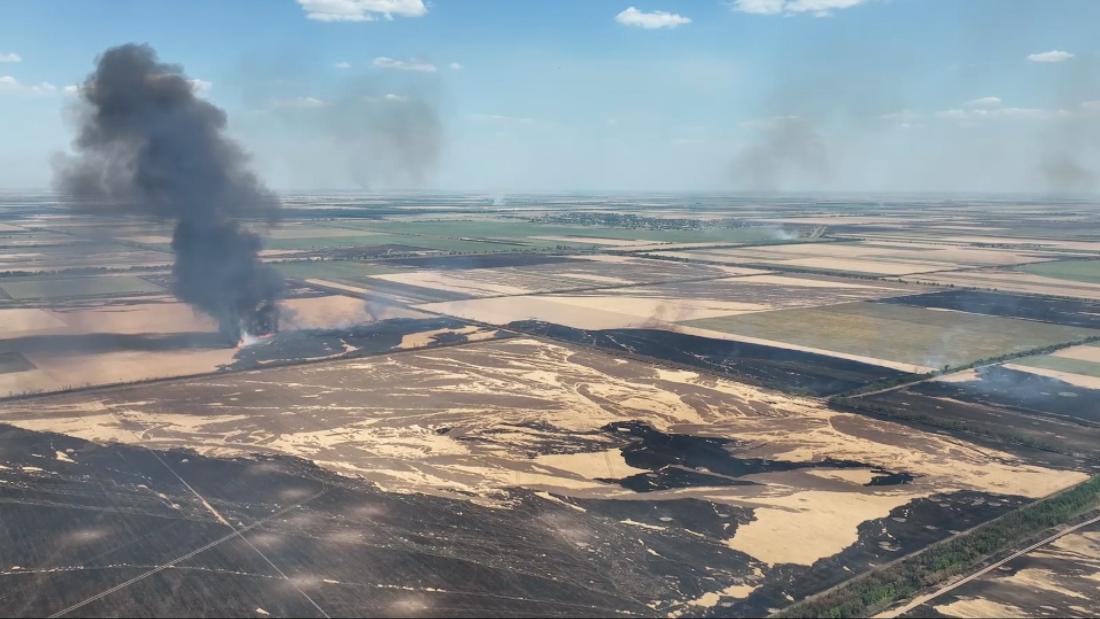 Drone footage shows Russian artillery pounding Ukrainian wheat fields