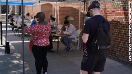 People wait in line for monkeypox vaccination in New York City as the state leads the nation with the highest case count of the virus as of Friday.