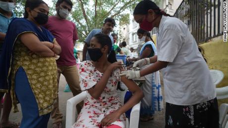 A health worker administers a Covid-19 vaccine in Hyderabad, India, on July 15.