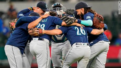 The Seattle Mariners celebrate victory against the Texas Rangers.