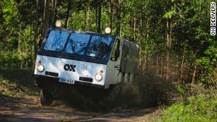 A pay-as-you-go electric truck is making deliveries on Rwanda&#39;s dirt roads