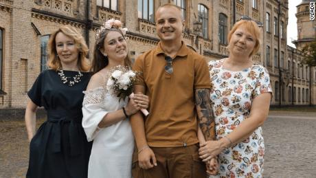 Vlada and her husband Ivan with their mothers on their wedding day.