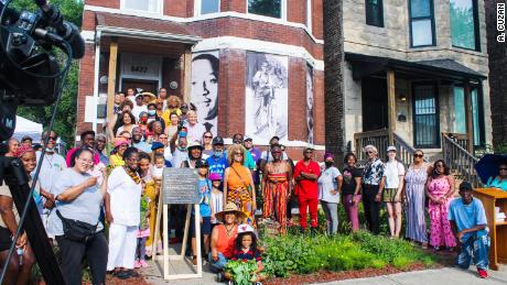 People gather outside Emmett Till&#39;s house in Chicago on what would have been his 80th birthday on July 25, 2021.