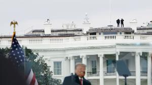 Members of the Secret Service patrol from the roof of the White House as US President Donald Trump speaks to supporters from The Ellipse on January 6, 2021, in Washington, DC. - Thousands of Trump supporters, fueled by his spurious claims of voter fraud, are flooding the nation&#39;s capital protesting the expected certification of Joe Biden&#39;s White House victory by the US Congress. (Photo by MANDEL NGAN / AFP) (Photo by MANDEL NGAN/AFP via Getty Images)