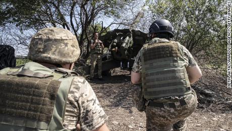 Ukrainian artillerymen checking equipment in Kherson on July 15, 2022.