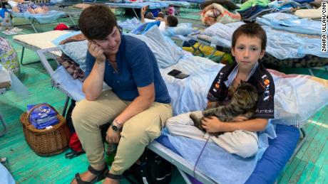 A woman named Irina said that she fled the war zone with her son Rostislav and their cat Polik.
