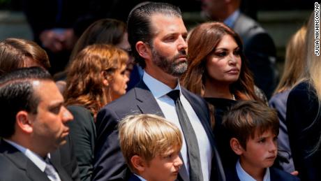 Donald Trump Jr. watches as his mother&#39;s casket is carried into a church on Wednesday.