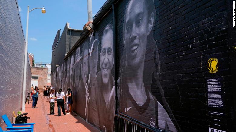 Families of Americans detained abroad unveil mural of loved ones and call on country not to forget them