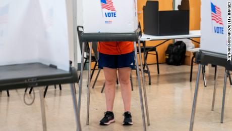 BALTIMORE, MD - JULY 19:  A voter casts their ballot at a polling place at The League for People with Disabilities during the midterm primary election on July 19, 2022 in Baltimore, Maryland. Voters will choose candidates during the primary for governor and seats in the House of Representatives in the upcoming November election.  (Photo by Nathan Howard/Getty Images)