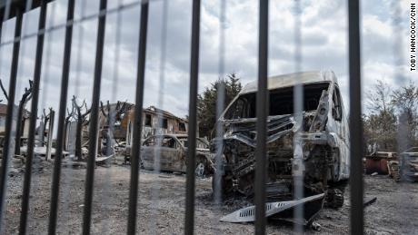 Burned out cars and homes in the aftermath of the wildfire that tore through Dagenham.