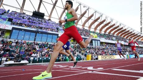Algeria&#39;s Djamel Sedjati crosses the line to win the men&#39;s 800 meters semifinal during the World Athletics Championships in Oregon on July 21.  