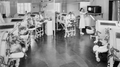 Iron lung patients at a Baltimore hospital are getting televisions for the first time.  Mirrors allow them to watch the broadcasts.