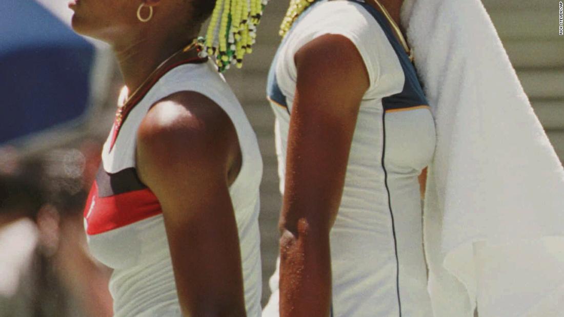Serena, left, walks past Venus as they played against each other in the second round of the Australian Open in 1998. It was Serena&#39;s first grand slam tournament. Venus won the match 7-6, 6-1. 