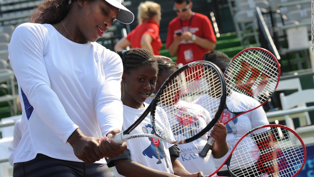 Williams demonstrates a proper backhand during a clinic held in Washington, DC, in 2011. That year, she underwent emergency treatment for a hematoma related to a pulmonary embolism, a blood clot in her lungs.