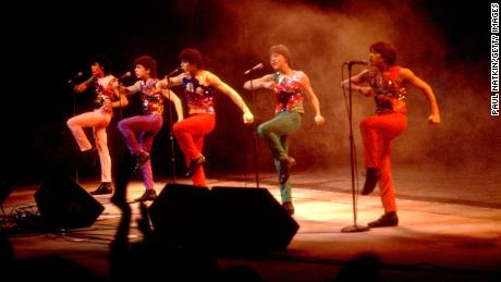The teen pop group Menudo performs onstage at the Aire Crown Theater in Chicago, Illinois on November 18, 1983. 