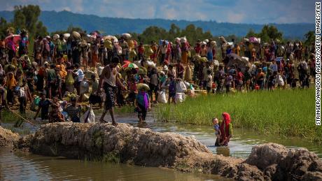 Rohingya refugees, fleeing military operations in Myanmar&#39;s Rakhine state, try to cross the border in Palongkhalii of Cox&#39;s Bazar, Bangladesh on October 16, 2017. 