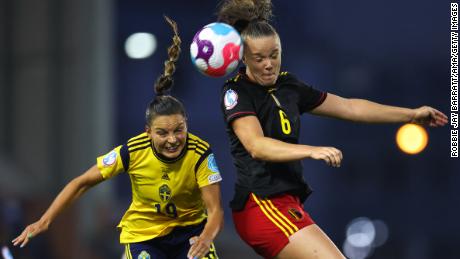 Sweden&#39;s Johanna Rytting Kaneryd (left) challenges for a header with Tine De Caigny of Belgium (right).