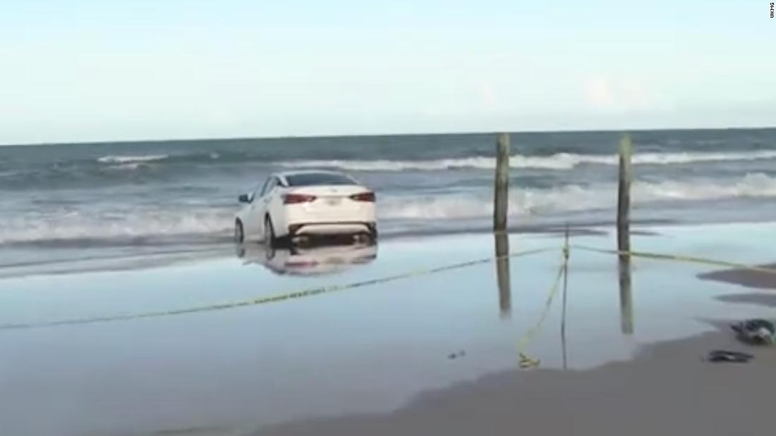 Florida man in apparent medical distress crashes car through beach crowd before hitting the water