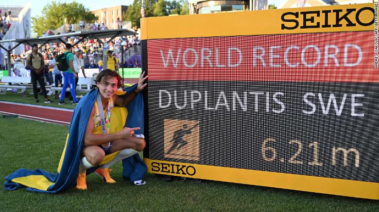 Armand Duplantis celebrates setting a world record in the men&#39;s pole vault at the World Athletics Championships.